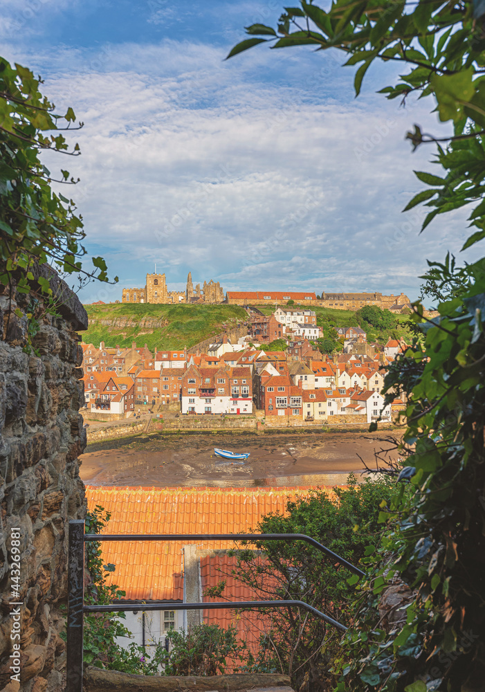 Whitby harbour from an alleyway.