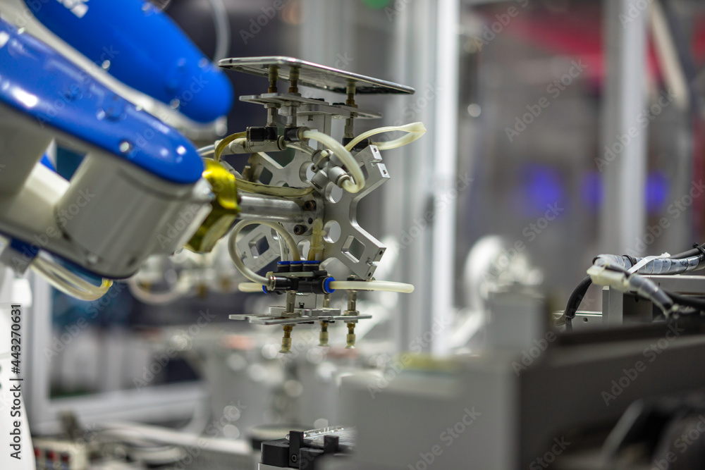 robot arm working in factory robot arm working in factory