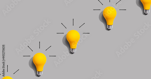 Yellow light bulb pattern with shadow