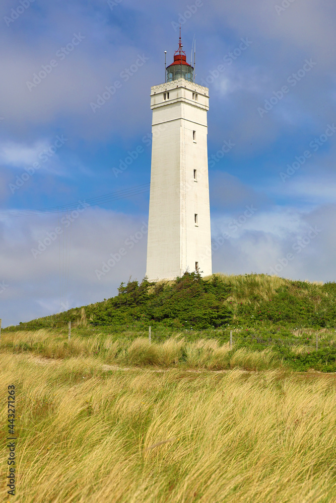 the white square lighthouse of Blavandshuk in denmark