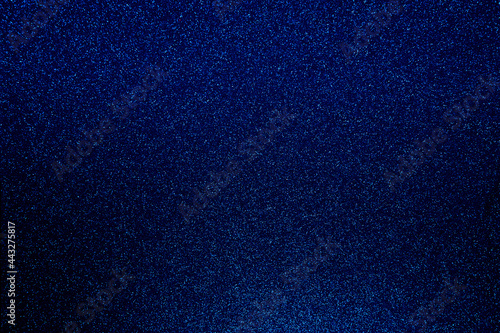 Dark blue bokeh glitter texture christmas abstract background