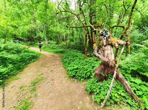 Mythical figure next to PR AS 137 trail between Valbucar and Busllaz villages, also known as 'Molinos del profundu', Villaviciosa, Asturias, Spain photo