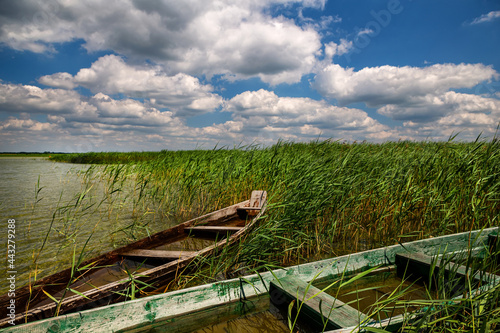 Svitiaz Lake  Shatsk National Natural Park  Volyn region  Ukraine. The Shatskyi Lakes group. Boat on the shore of the lake. Beach by the lake.