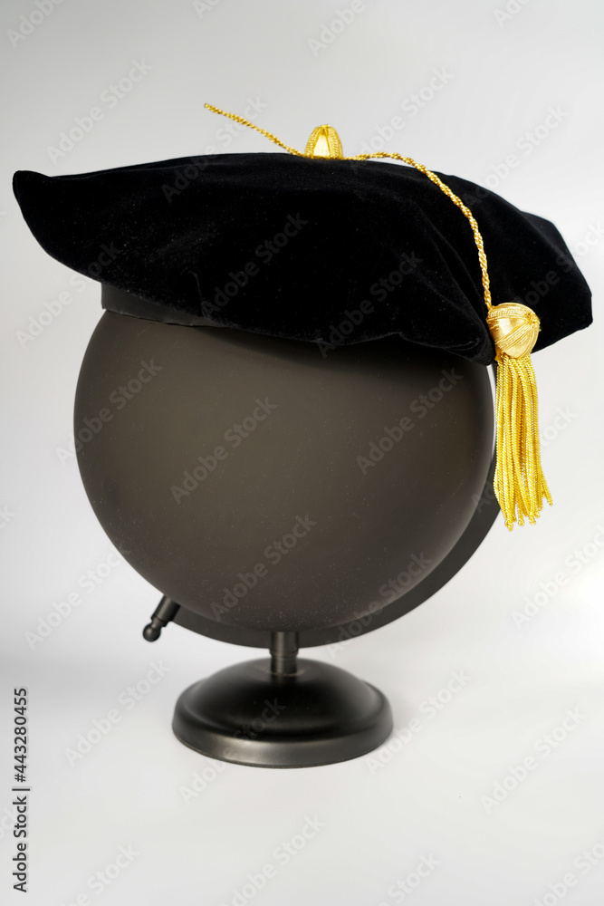 Black PhD doctorate tam cap with gold tassel - obrazy, fototapety, plakaty 