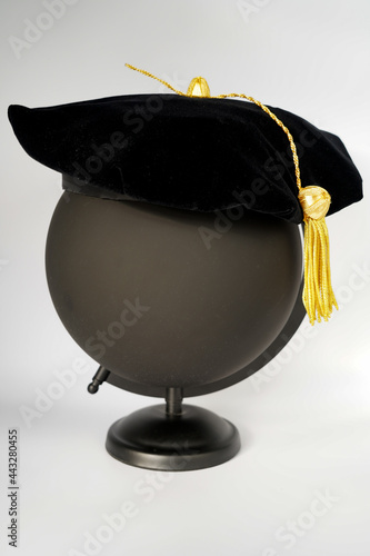 Black PhD doctorate tam cap with gold tassel photo