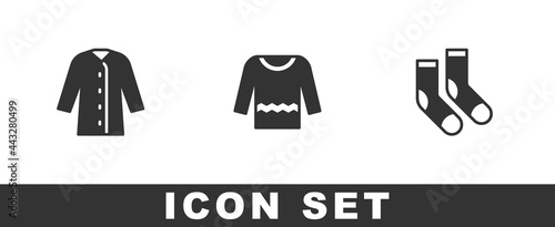 Set Raincoat, Sweater and Socks icon. Vector