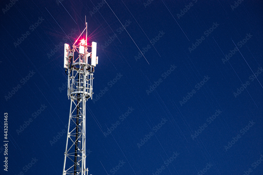 telecommunication tower in the evening - obrazy, fototapety, plakaty 