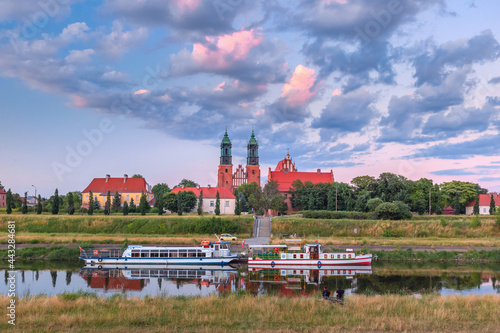 Poznan Cathedral on Ostrow Tumski and Warta River at sunset, Poznan, Poland