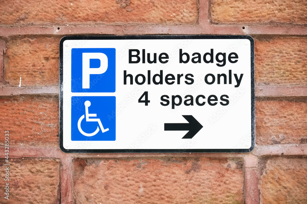 Disabled blue badge holder parking sign for driver 