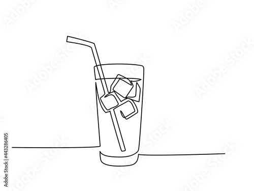 Glass of water with ice, old drink with a straw for drinking