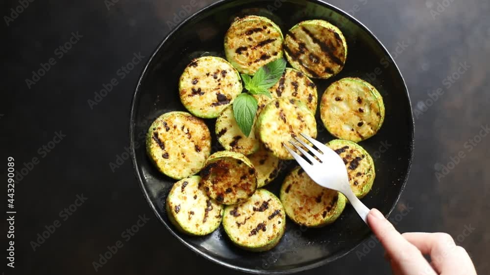 grilled zucchini fried vegetables on the table, healthy food meal snack copy space food background rustic. top view keto or paleo diet veggie vegan or vegetarian food grilled zucchini fried vegetables on the table, healthy food meal snack copy space food background rustic. top view keto or paleo diet veggie vegan or vegetarian food