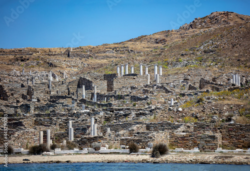 Delos ruins of ancient civilization at seaside Cycladic island Greece. photo