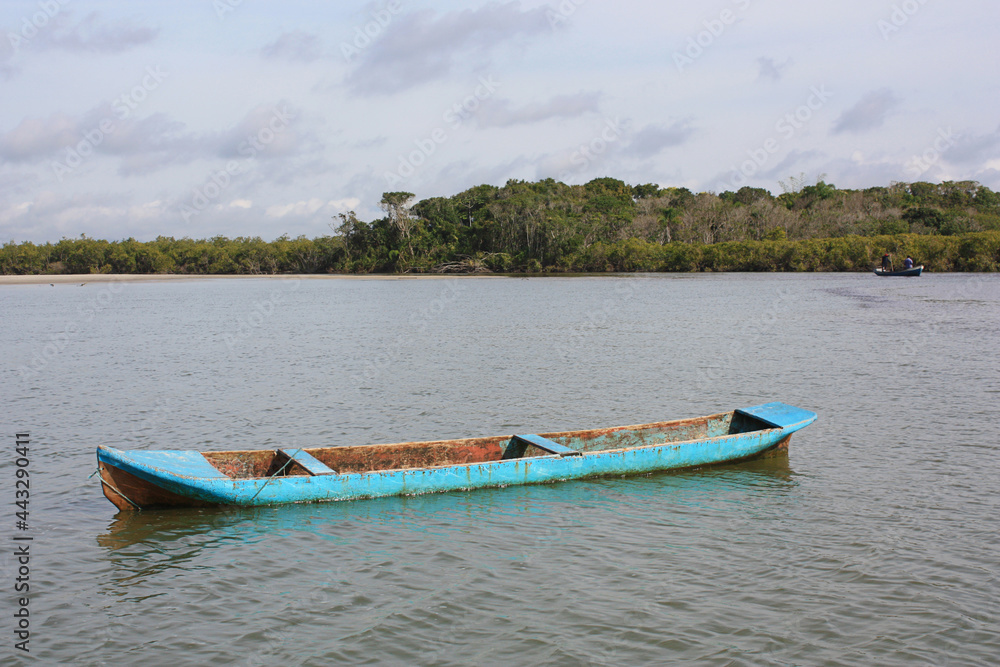 canoe blue fisherman