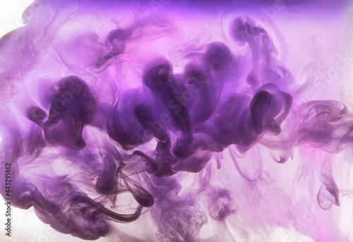 Abstract pink purple cloud of smoke, paint in water background. Fluid art wallpaper, liquid vibrant bright colors. Concept aphrodisiac perfume