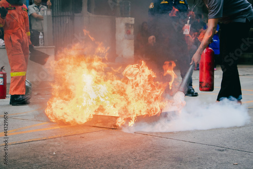 Employees firefighting training,Extinguish a fire.