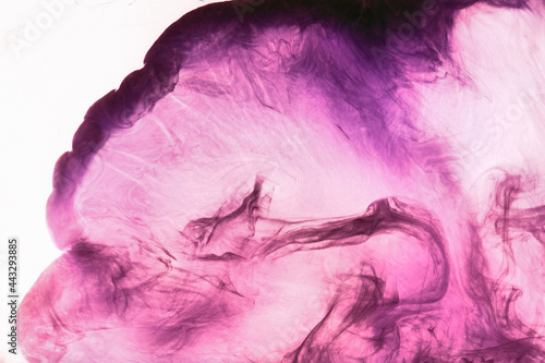 Abstract pink purple cloud of smoke, paint in water background. Fluid art wallpaper, liquid vibrant bright colors. Concept aphrodisiac perfume