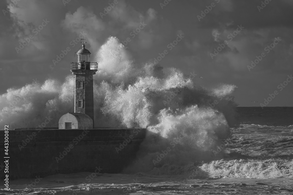 Infrared big wave splash at Douro river lighthouse