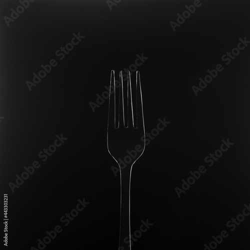 fork on black background