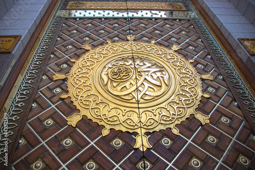 The door of Masjid Nabawi. Arabic Calligraphy: Muhammad Rasulullah photo