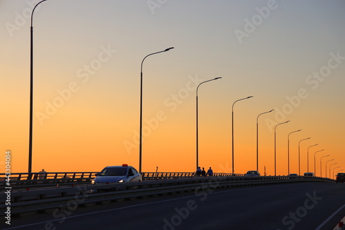 Photography Pedestrians and cars on the bridge over the Volga, sunset, Moscow region, July 2