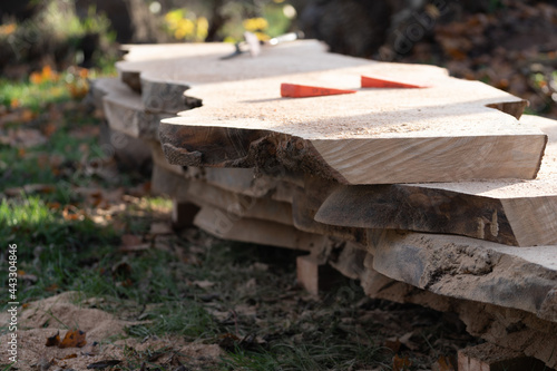 Принти на полотні plate ashen wooden boards cut and stacked in a pile with a blurred background