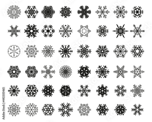 Set of different black snowflakes on a white background	
