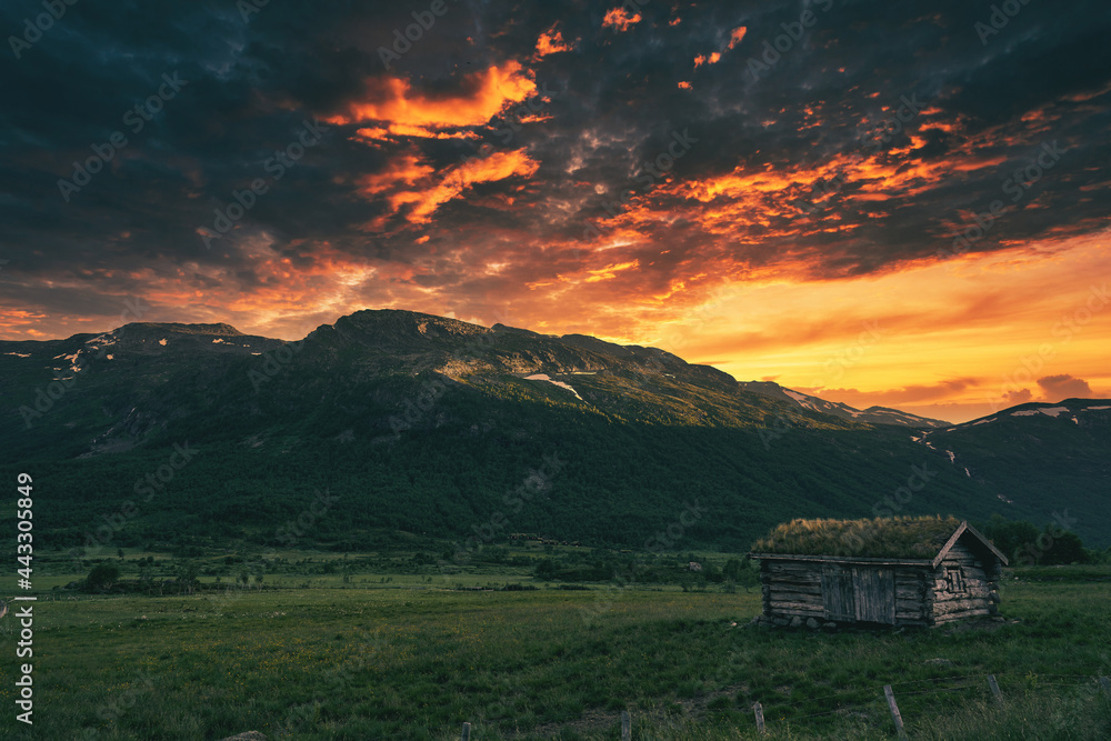 Wild mountains of Hemsedal. The nature is wild and the scenery is set. Golden hour light and dramatic sky. Country life here is not bad. Wild mountains of Hemsedal. The nature is wild and the scenery is set. Golden hour light and dramatic sky. Country life here is not bad.