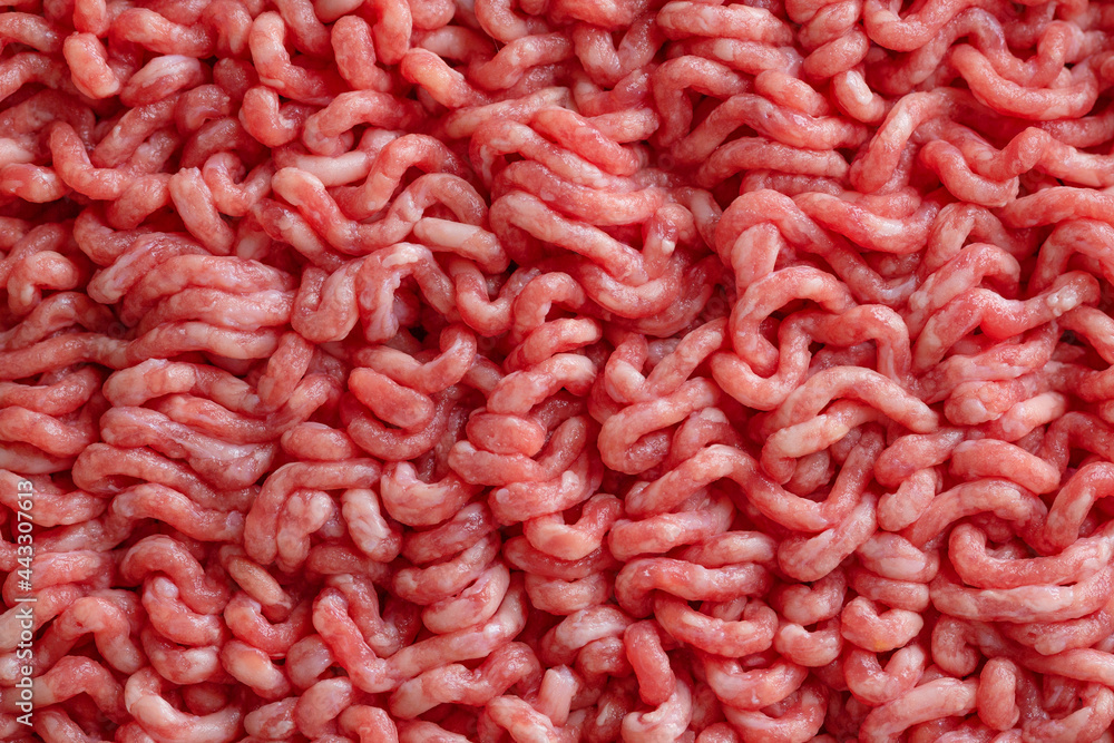 Minced meat with spices on table Minced meat with spices on table