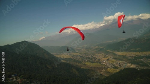 paragliding in the himalayan mountains 
