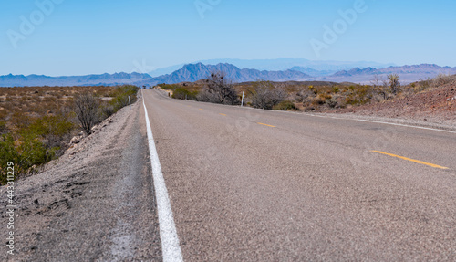 Low Angle View of Tww Way Road in the Navada Desert photo