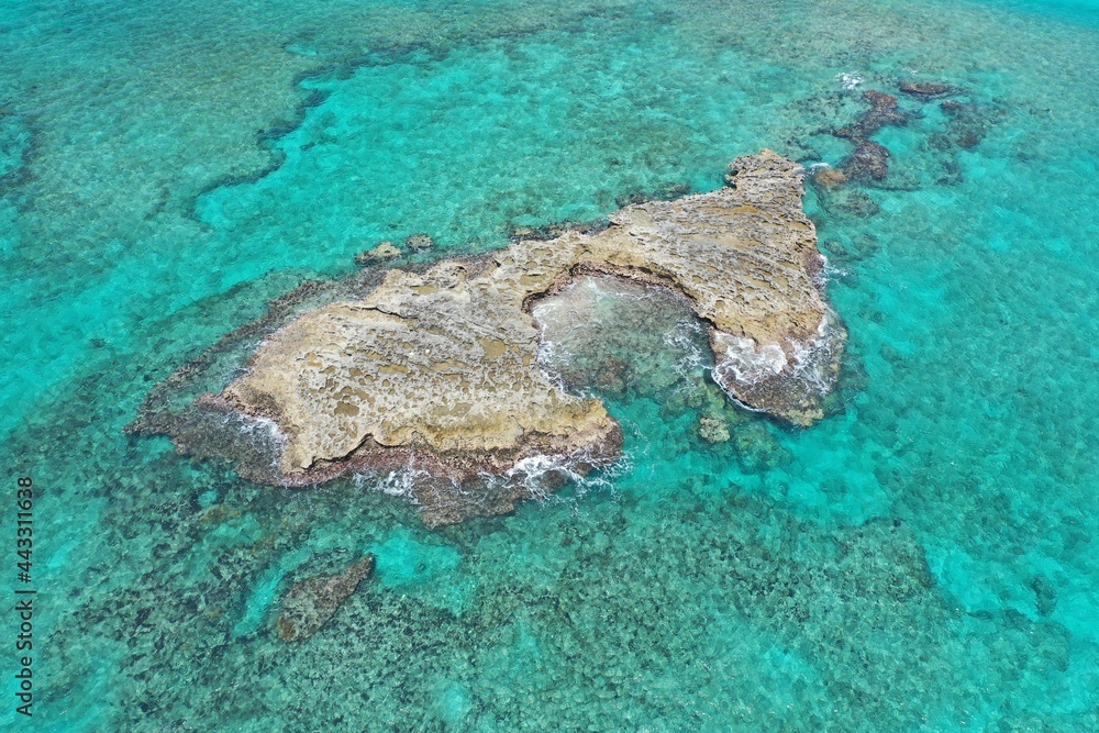 Aerial view of coral rocks off North Bimini, Bahamas on sunny summer afternoon.