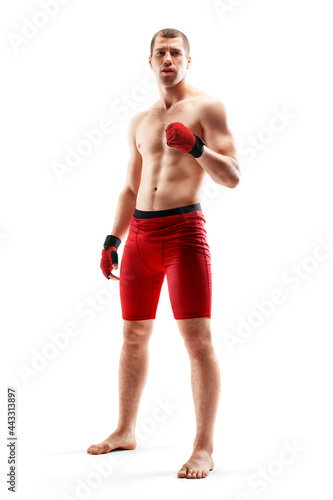 MMA fighter shows strength. Isolated on white background. Emotions of winner. Athlete. Sport