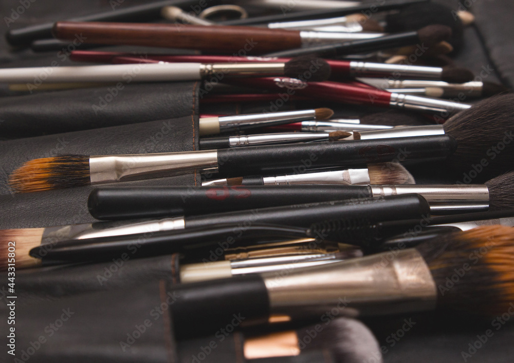 A set of professional accessories make-up artist, brushes for applying cosmetics and makeup, close-up A set of professional accessories make-up artist, brushes for applying cosmetics and makeup, close-up