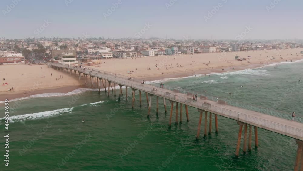 Aerial: Hermosa Beach Pier and tourists. Los Angeles, USA Aerial: Hermosa Beach Pier and tourists. Los Angeles, USA