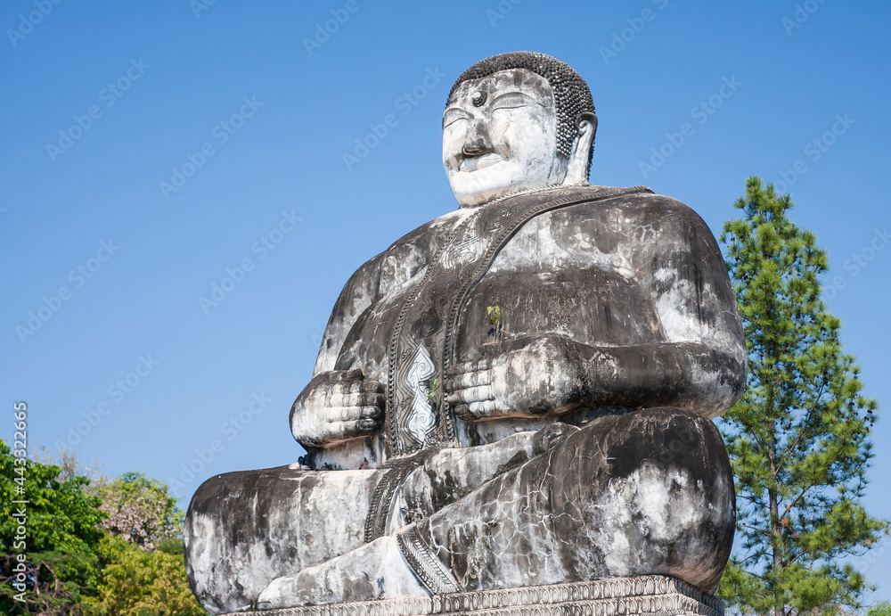 Buddhist Stone Statues with Blue Sky and Copy Space
