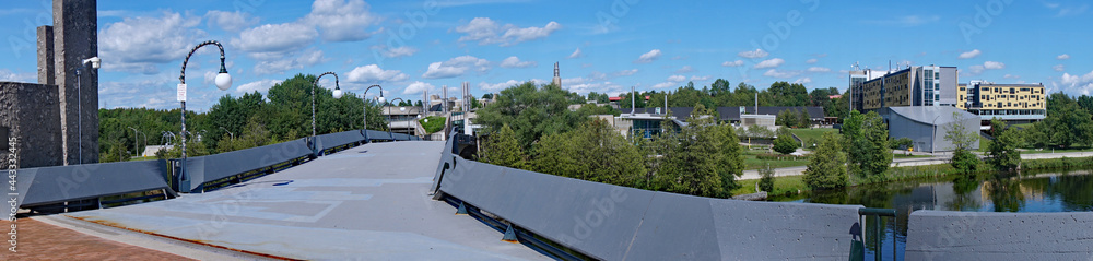 Trent University is a small city liberal arts university with modern architecture in a scenic riverside location.