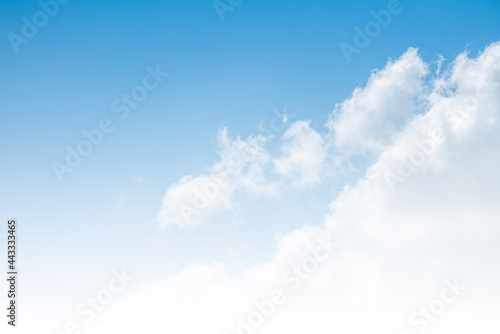 Beautiful blank background over the clouds with cleared blue sky  soft looks image  close up to the clouds  grading white color from below.