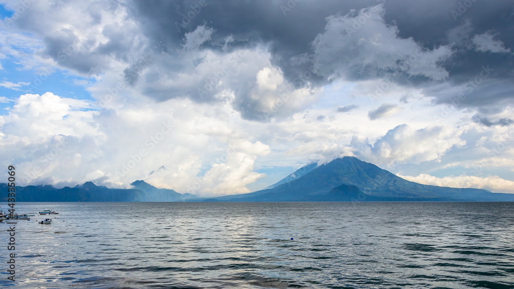 Spectacular landscape of a cloudy Lake Atitlán, in the Guatemalan highlands, Central America