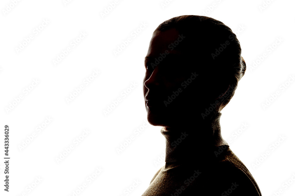 Dark silhouette of a woman on white background close-up. Dark silhouette of a woman on white background close-up.