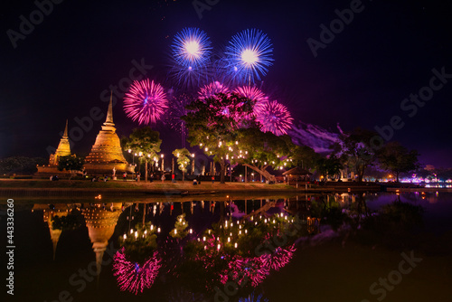 Firework of Loi Krathong festival showing in Sukhothai historical park. Sukhothai, Thailand.