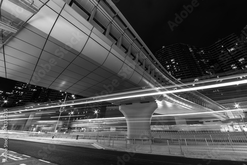 Light trail of traffic in downtown district of Hong Kong city at night