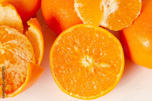 Sliced tangerine orange close up.
