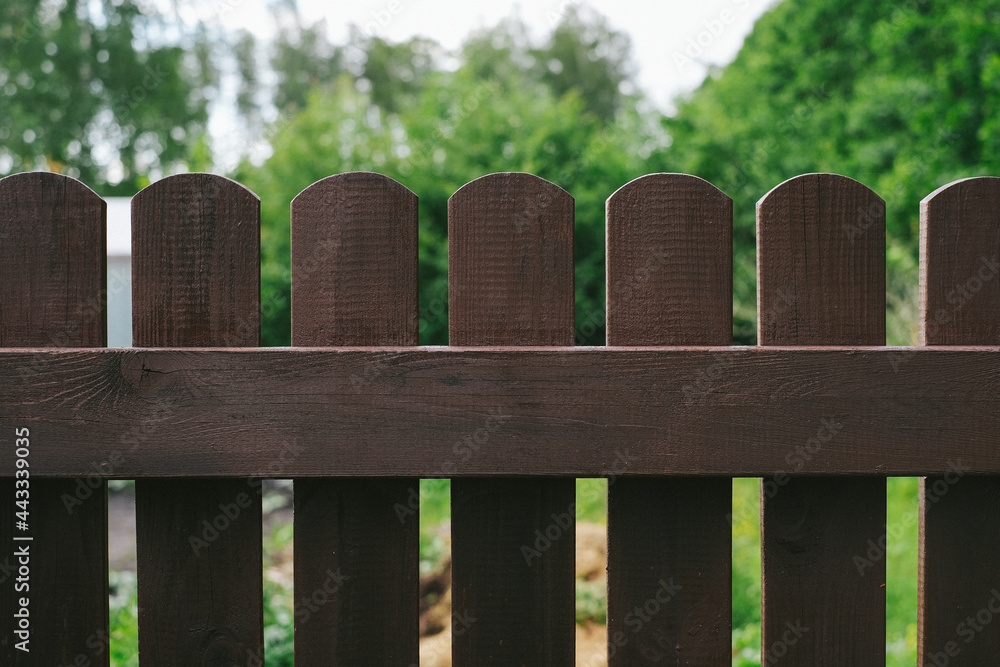 Fototapeta premium Fence built from wood. Outdoor landscape. Security and privacy concept.