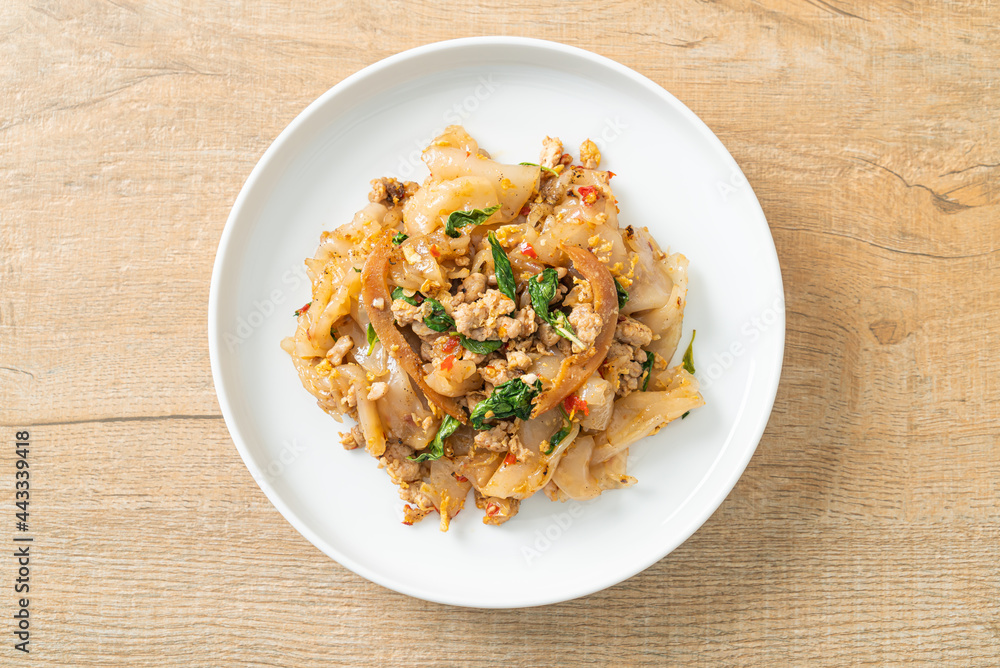 Stir-fried noodle with minced chicken and basil Stir-fried noodle with minced chicken and basil