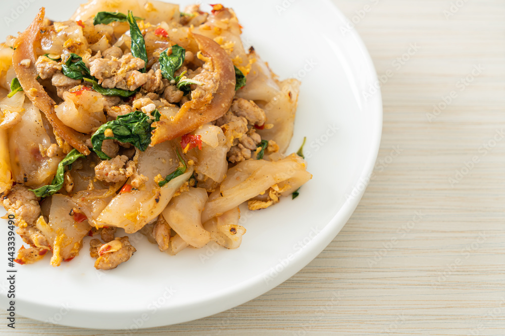 Stir-fried noodle with minced chicken and basil Stir-fried noodle with minced chicken and basil