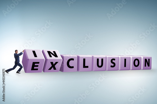 Businessman turning cubes in inclusion and exclusion concept photo