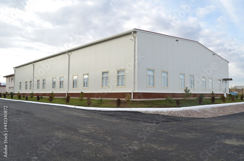 Modern industrial one storey building of a pharmaceutical factory
