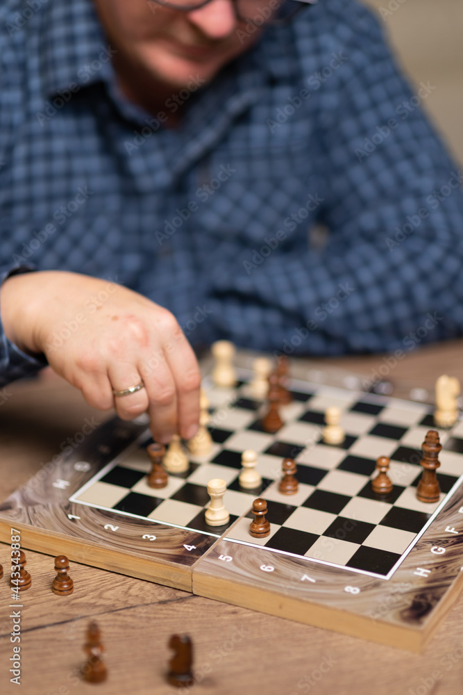 Fototapeta premium A man playing chess