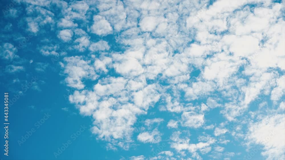Sky and cloudscape,white and white cloud float in light blue sky.Time lapse video. Sky and cloudscape,white and white cloud float in light blue sky.Time lapse video.