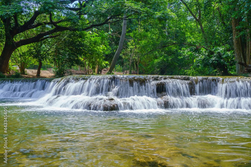 Fototapeta premium Waterfall in rain forest at Chet Sao Noi waterfall National Park